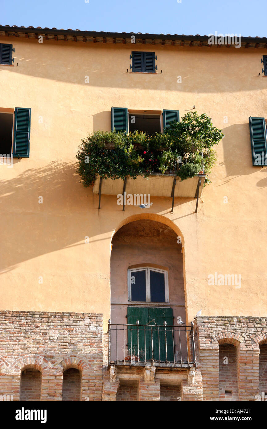 Houses are built on top of the historic wall around the  medieval town of Jesi in Le Marche Italy Stock Photo