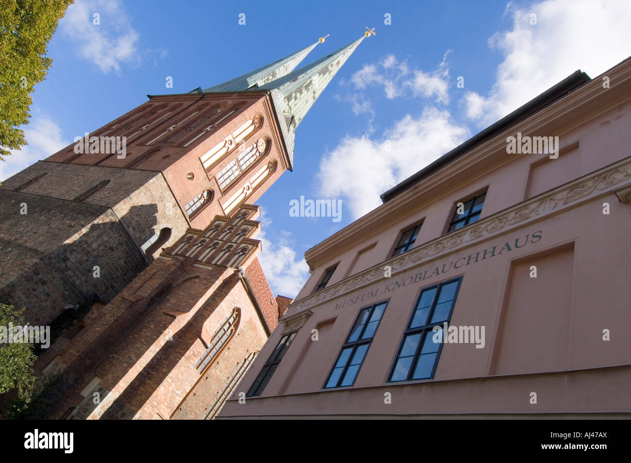 The Nikolaikirche or church of Saint Nicholas in the area Nikolaiviertel next to the Knoblauch haus museum. Stock Photo