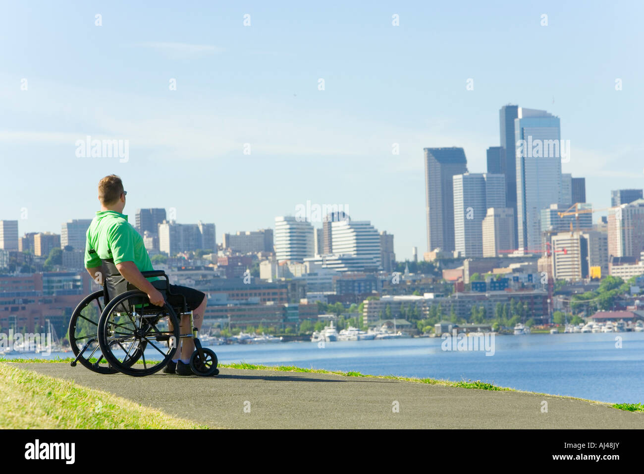 Male in wheelchair thinking hi-res stock photography and images - Alamy