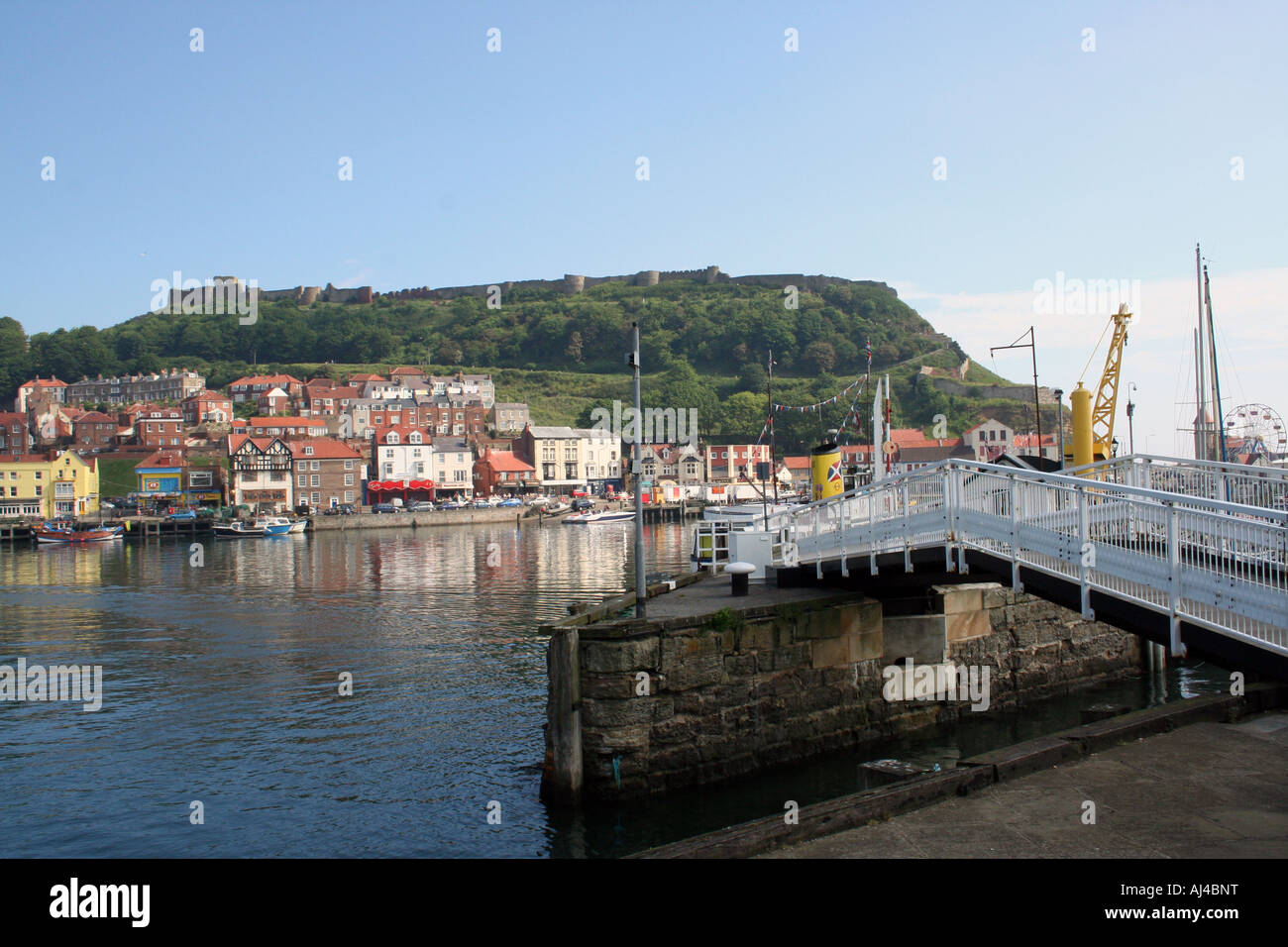 Scarborough harbour and castle pictured in the resort of Scarborough in North Yorkshire in England. Stock Photo