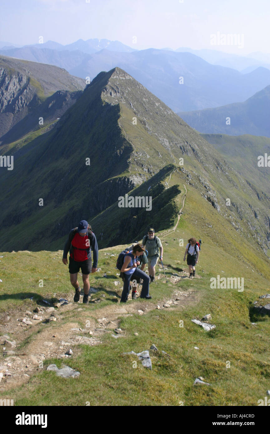 Hillwalkers on The Devil's Ridge on the Ring of Steall Stock Photo