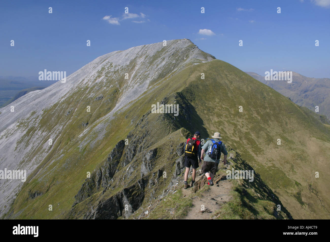 Male hillwalkers The Devil's Ridge on the Ring of Steall Stock Photo
