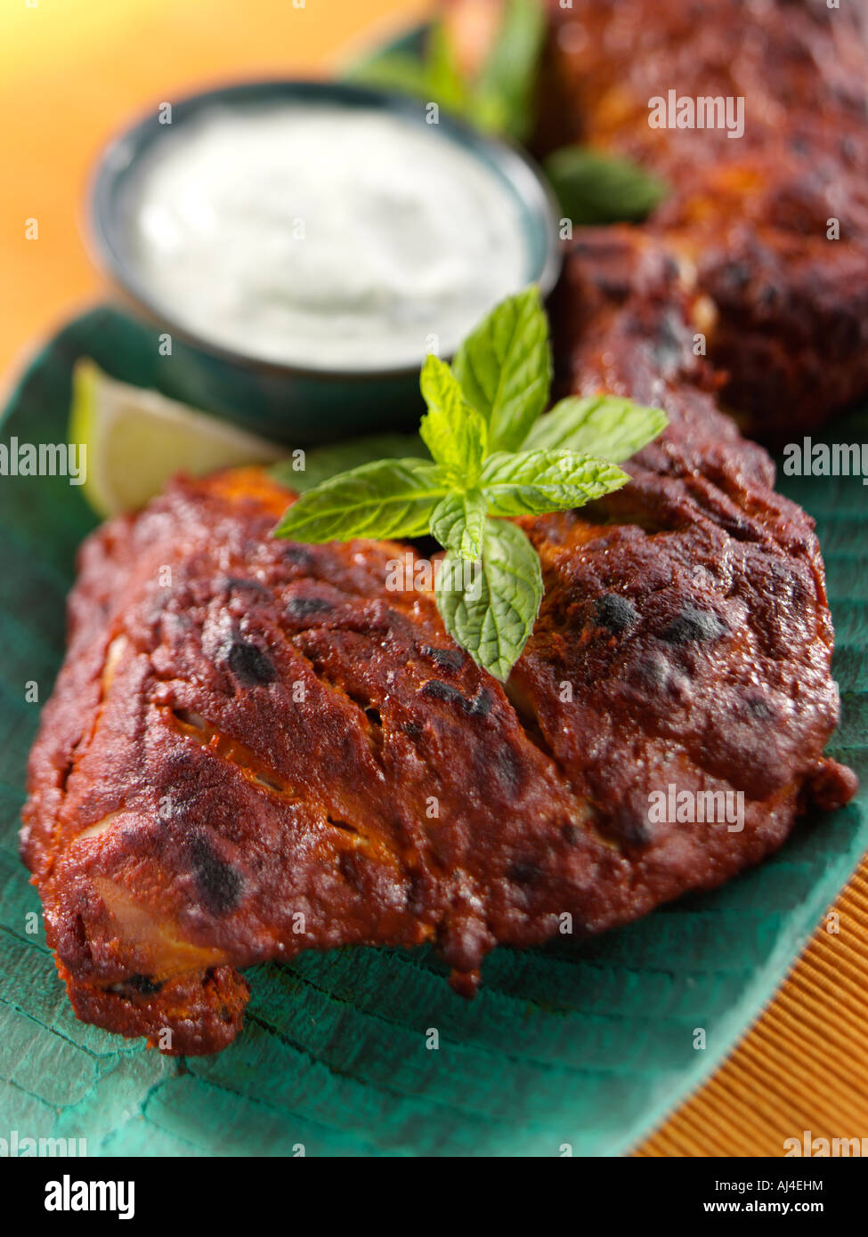 Indian tandoori chicken with yoghurt Stock Photo