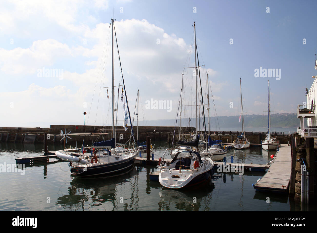 Scenic view of yachts moored in Scarborough harbor marina, North Yorkshire, England. Stock Photo