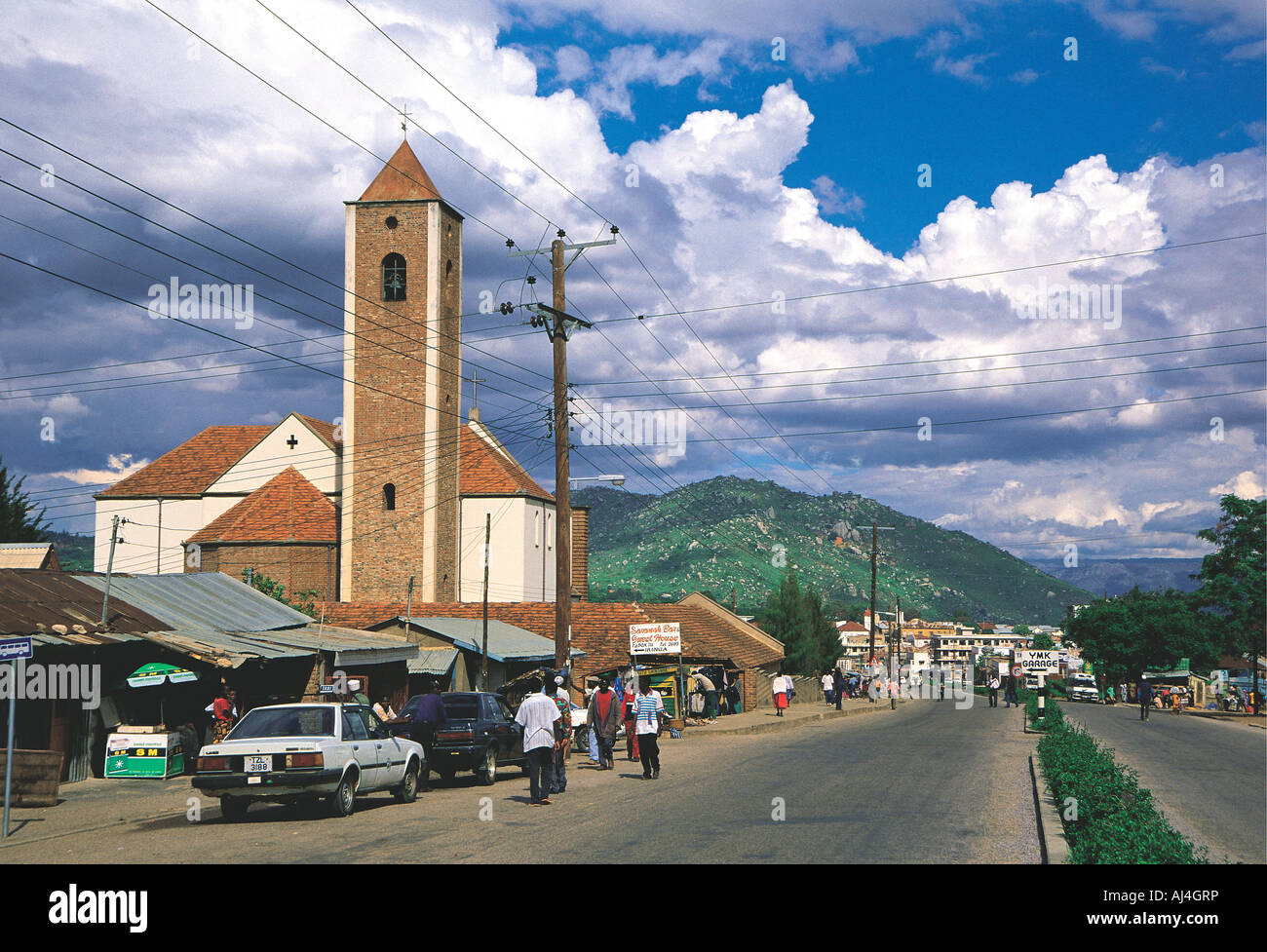 Church with bell tower and street scene lringa Tanzania Stock Photo