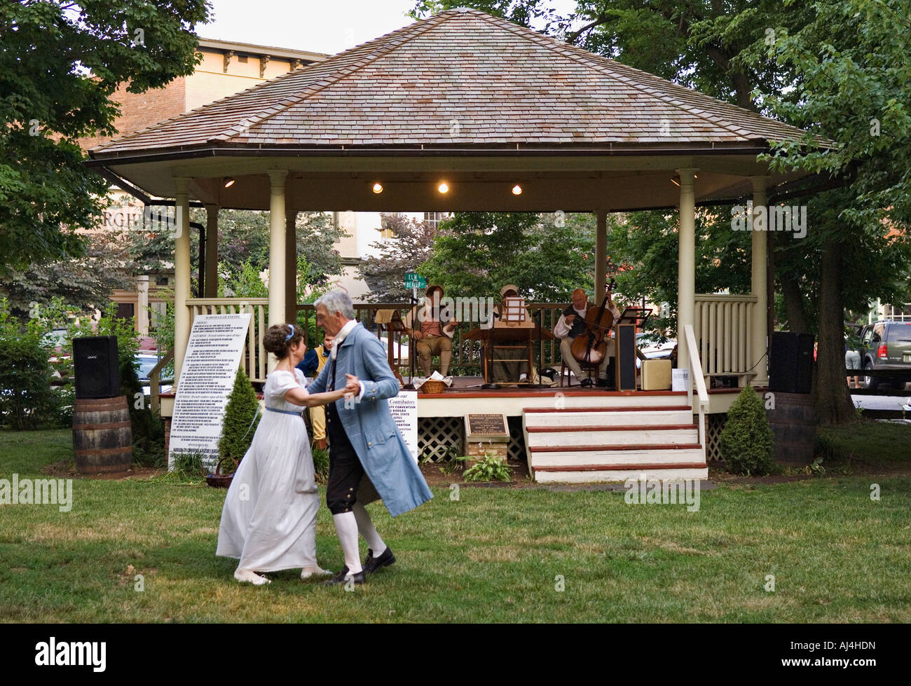 Older Couple in American Civil War Era Costume Dancing in front of Town Square Band Stand Corydon Indiana Stock Photo