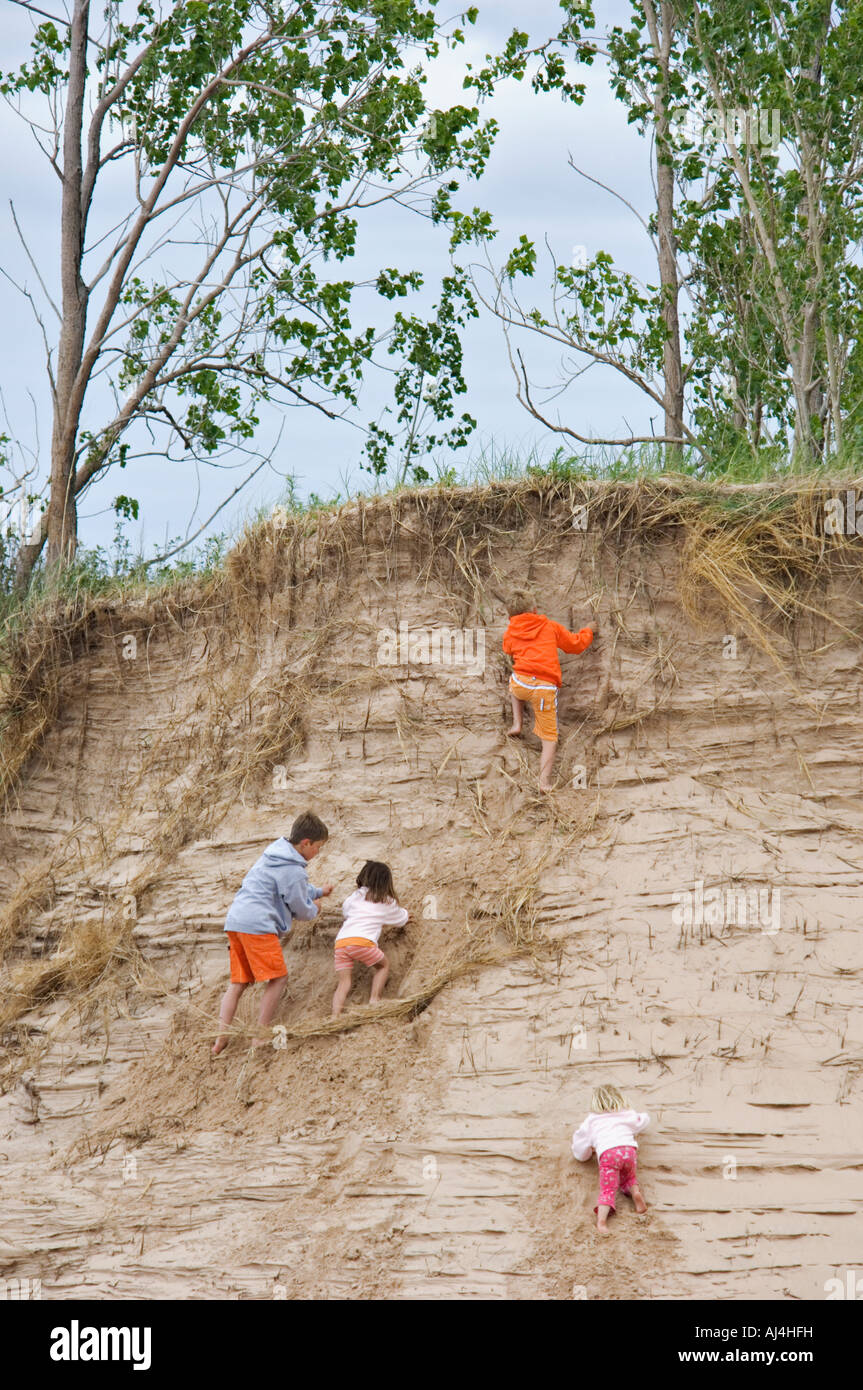 Children Climbing Sand Dune Above Lake Michigan at Sleeping Bear Dunes