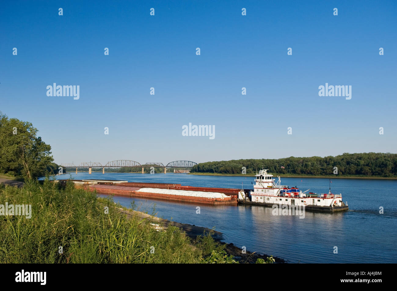 Towboat and Barge on the Ohio River Waiting to Enter the McAlpine Locks New Albany Indiana Stock Photo