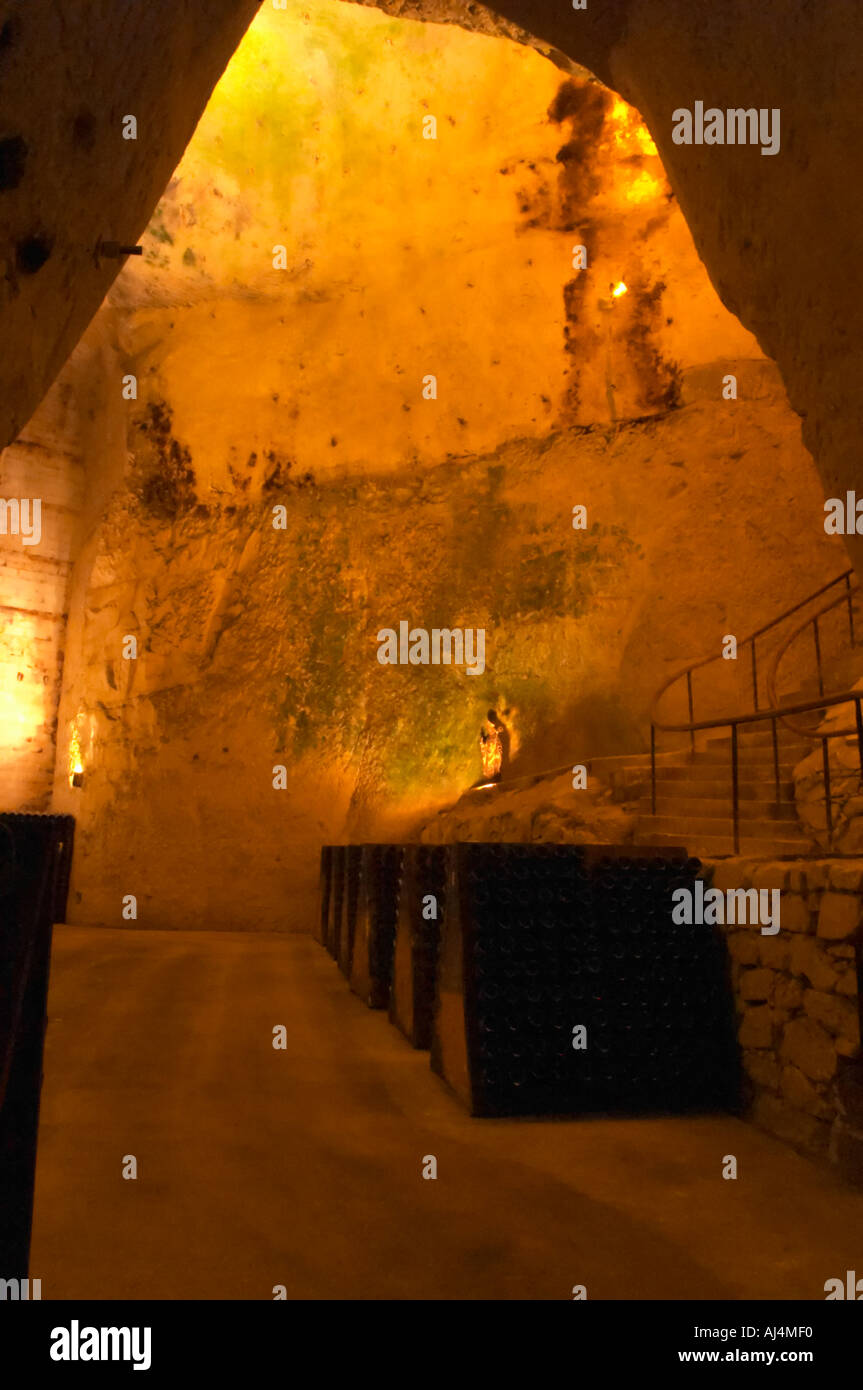 In the underground winecellar that is an old chalk quarry thousands