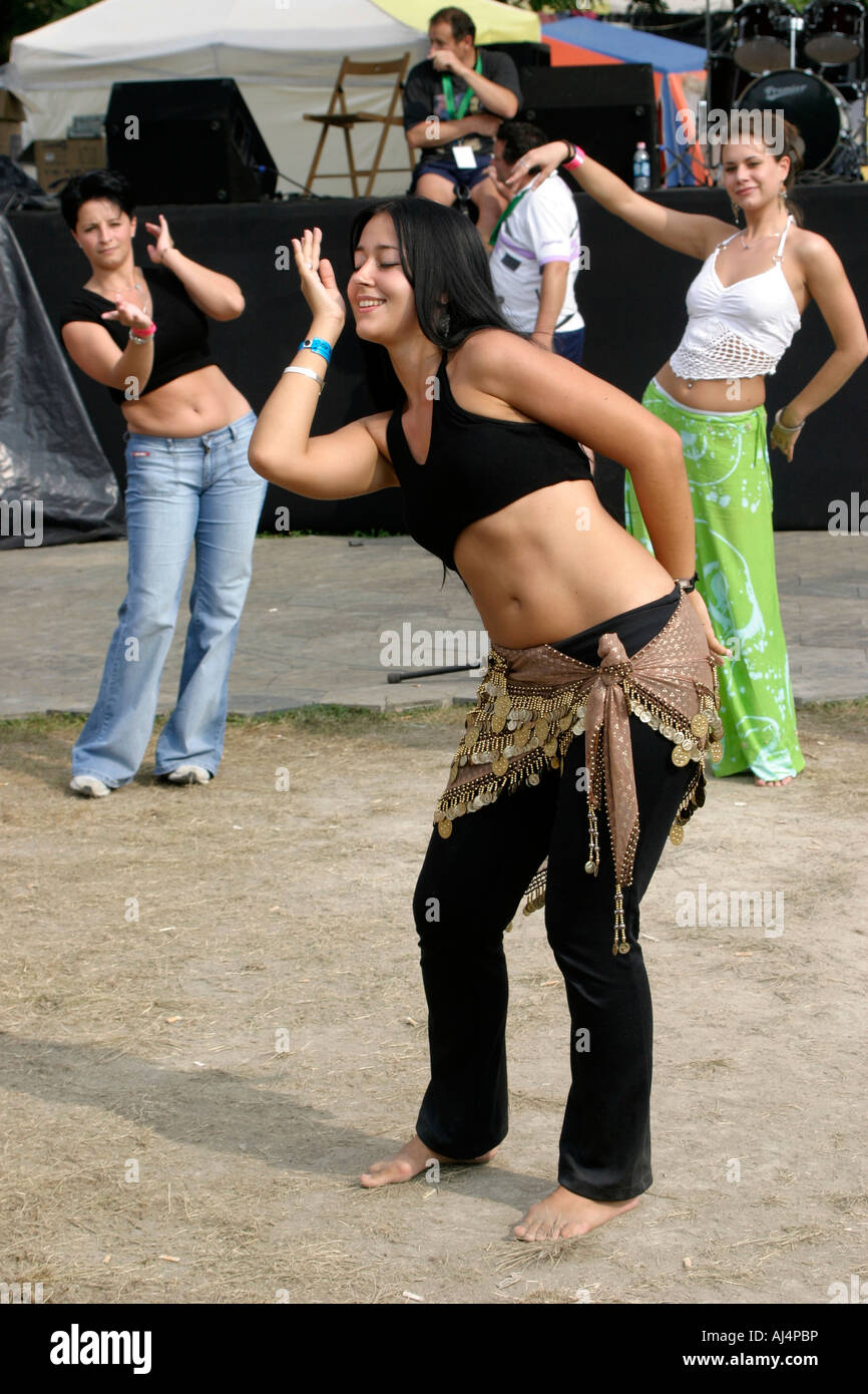 Young woman giving belly dance lessons at Sziget festival Budapest Hungary Stock Photo