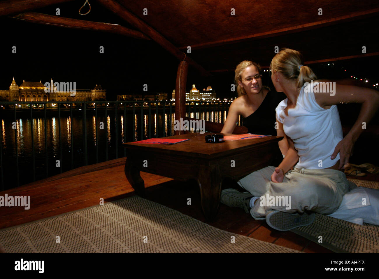 Friends on night out at Buddha Bar Budapest Hungary Stock Photo