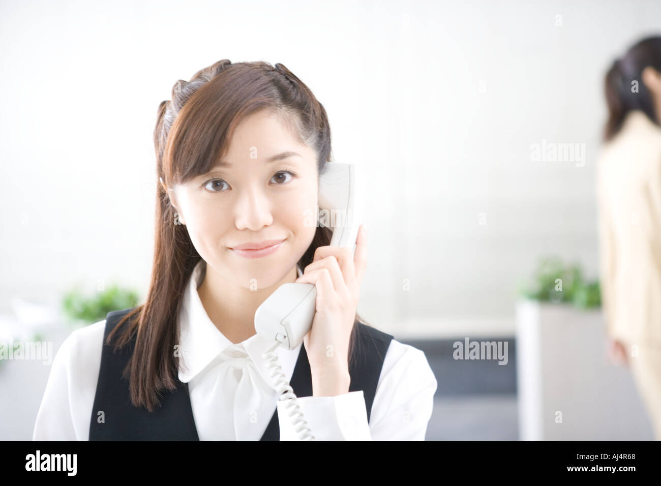 Japanese office women uniform hi-res stock photography and images - Alamy