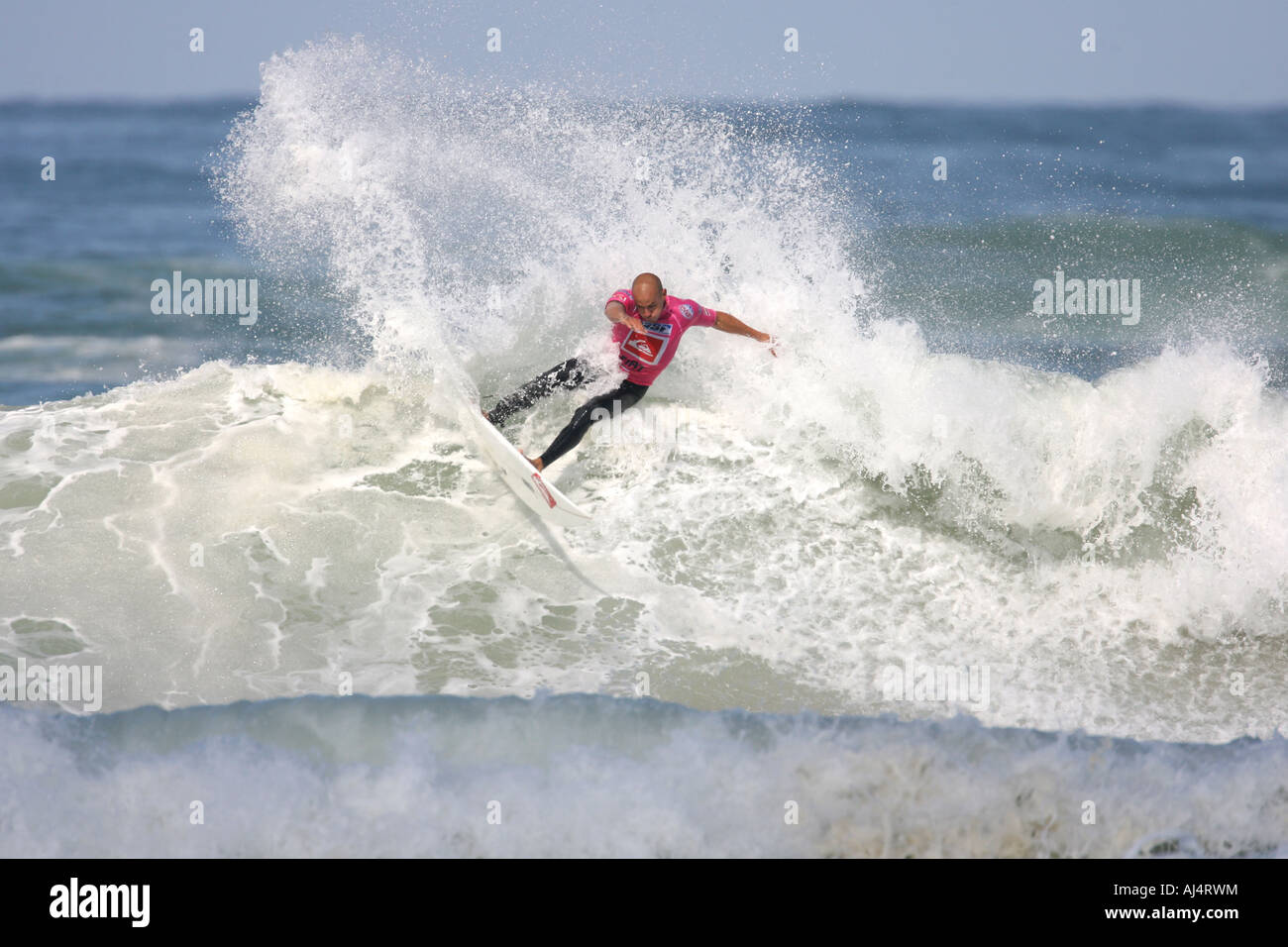 Pro Surfer Kelly Slater surfing a Wave Stock Photo