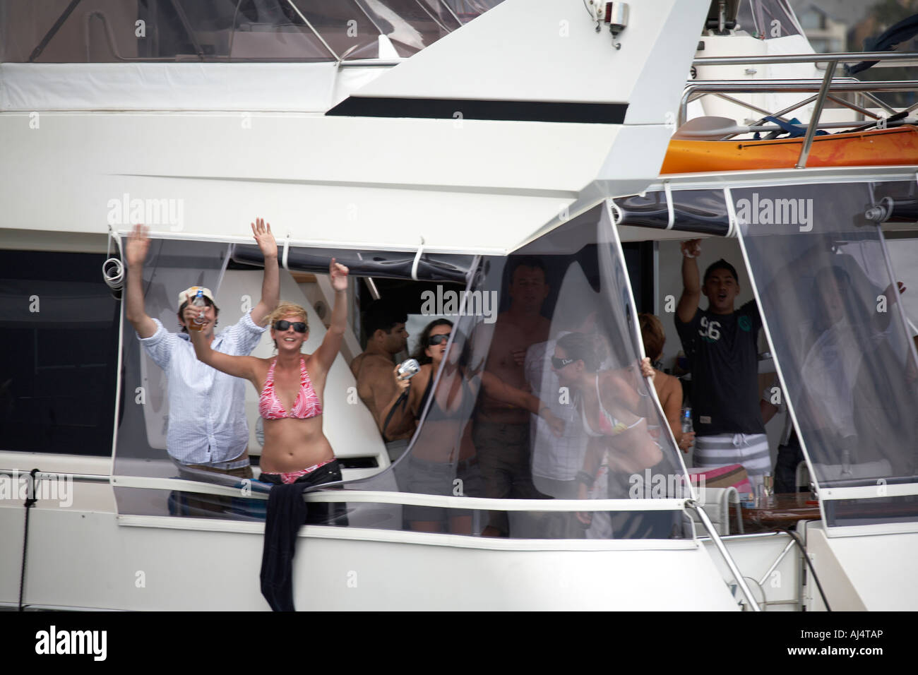 People having a party on a cruse boat in Sydney harbour New South Wales NSW Australia Stock Photo