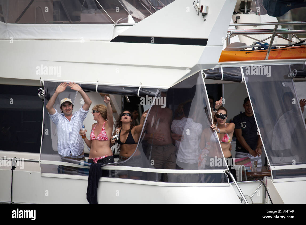 People having a party on a cruse boat in Sydney harbour New South Wales NSW Australia Stock Photo