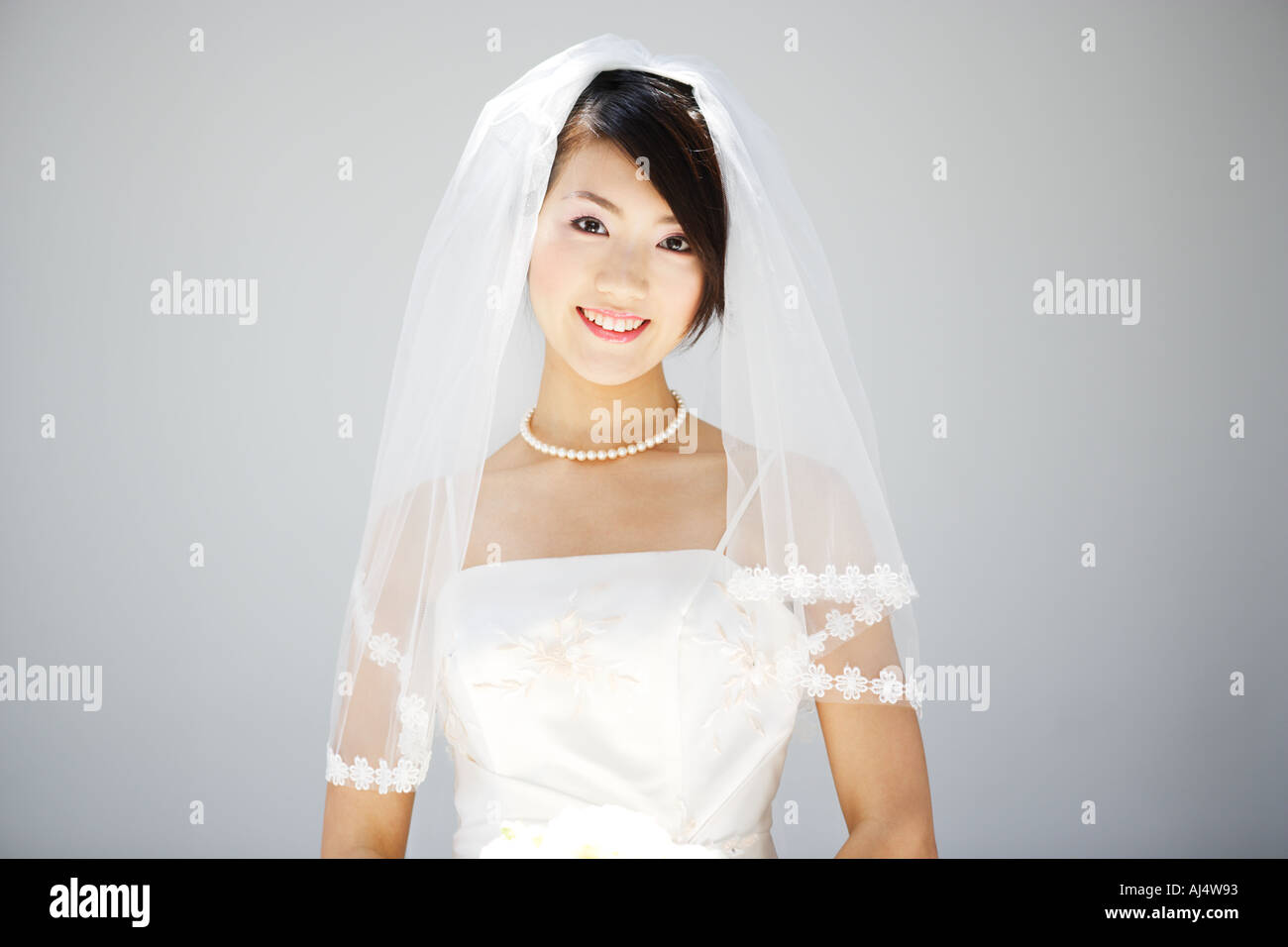 Bride looking at camera Stock Photo