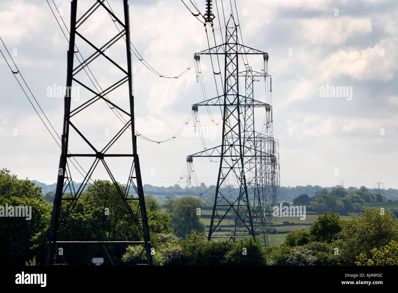 Electricity pylons carrying power to homes and businesses in the West Midlands England UK Stock Photo