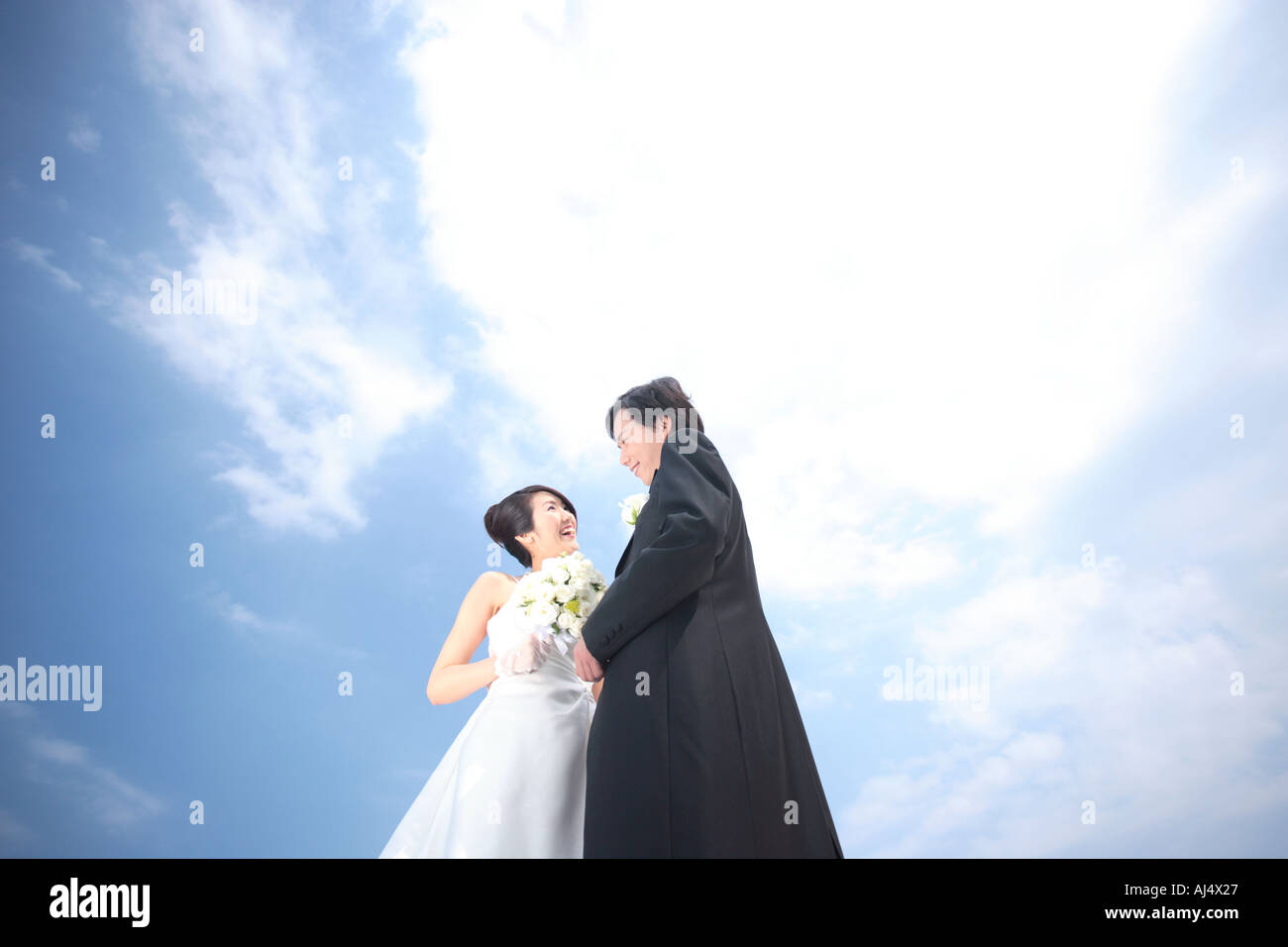 Bride and groom looking at each other Stock Photo