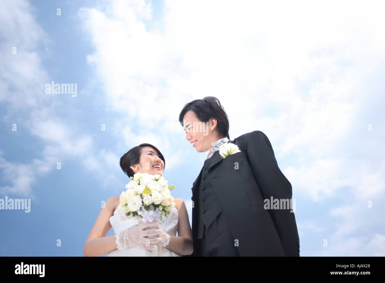 Bride and groom looking at each other Stock Photo