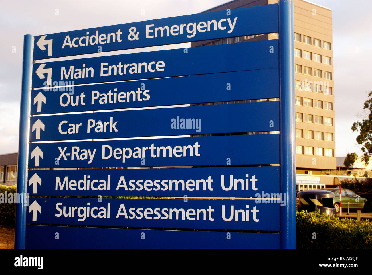 Hospital directions board directing patients to various clinical Stock