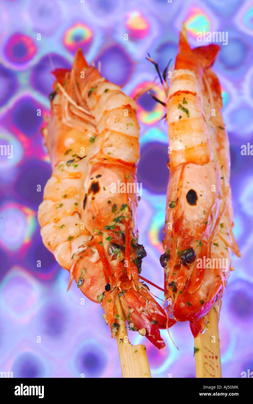 Grilled skewered tiger prawns Stock Photo Alamy