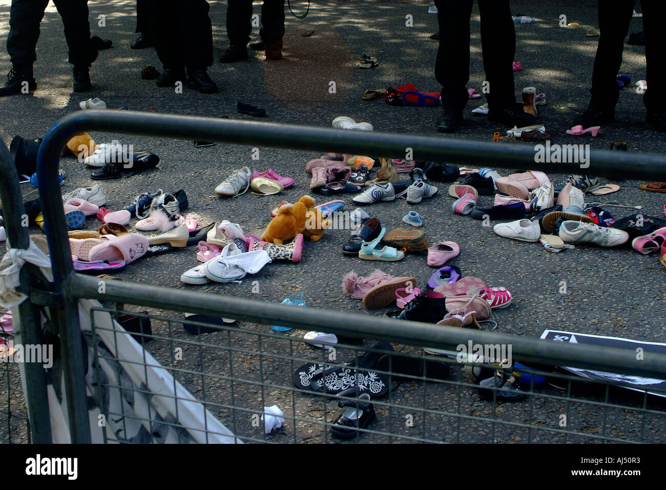 Childrens shoes litter the road outside Downing Street Stock Photo Alamy