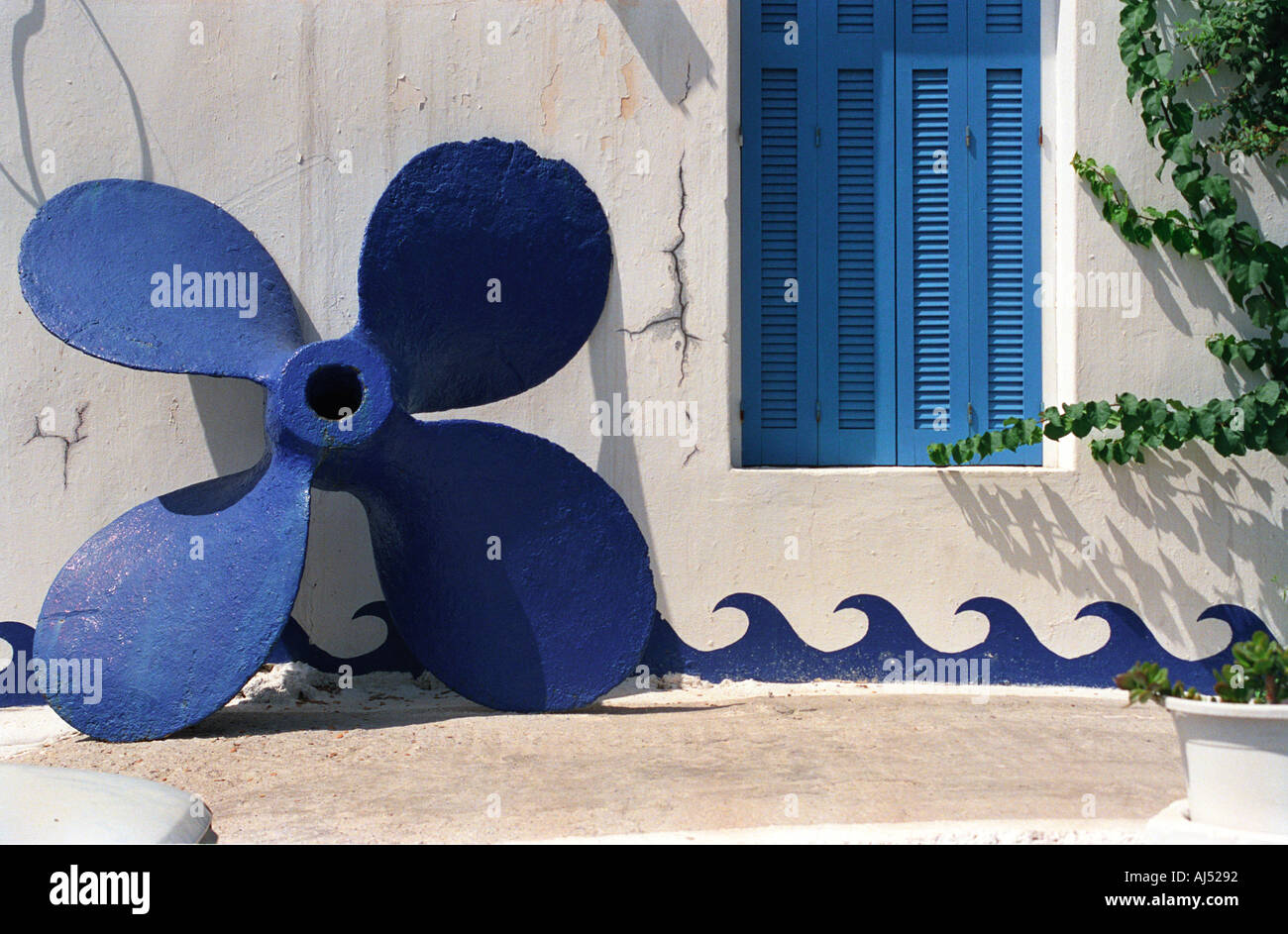 Blue propellor and wall decorations Ierepetra Crete Stock Photo