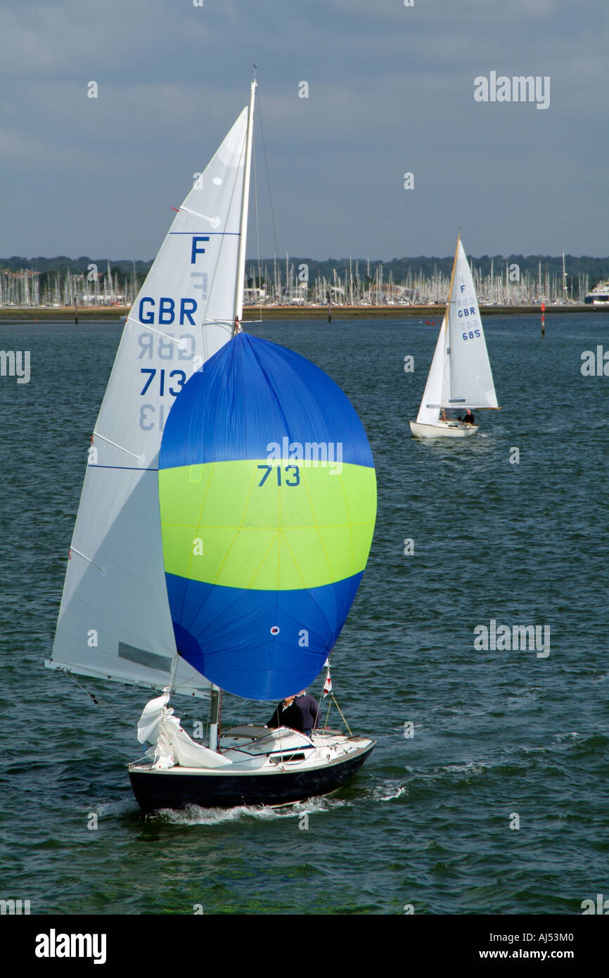 Folkboat sailing on the solent southern england uk sail hires stock