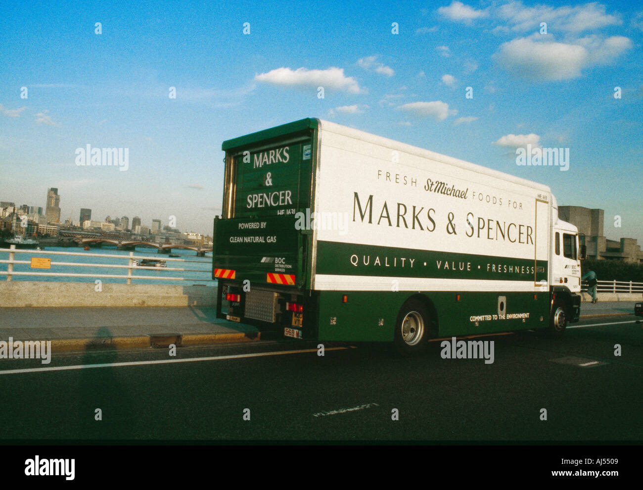 A Marks and Spencer lorry drives over a London bridge Stock Photo
