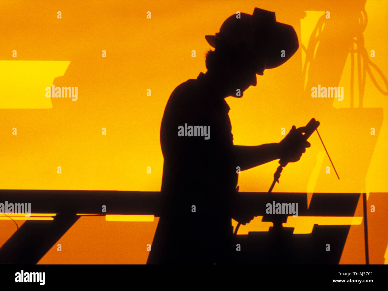 Construction worker welding steel on construction site Stock Photo