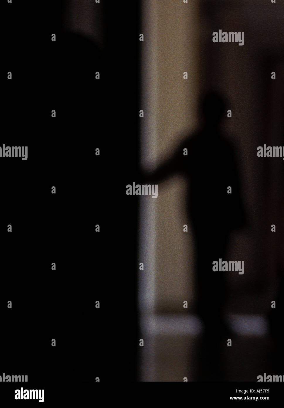 SIlhouette of a person in a hallway Stock Photo - Alamy