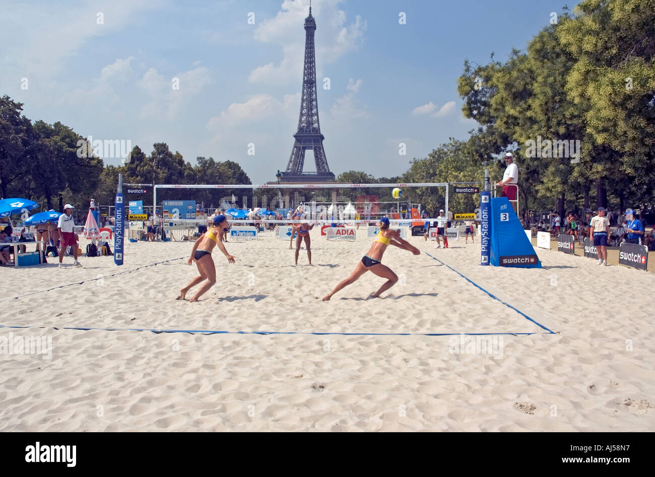 People playing beach volley ball on an artificial field near the Eiffel tower, during the Paris Plage event, Paris, France Stock Photo