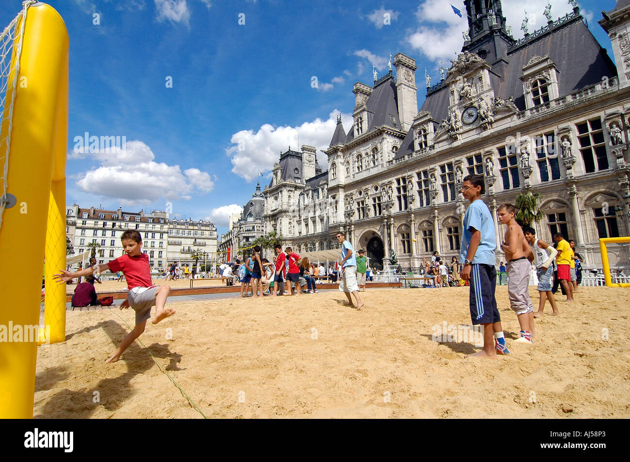 People playing beach soccer on an artificial field set up in front of City Hall during the Paris Plage event, Paris, France. Stock Photo