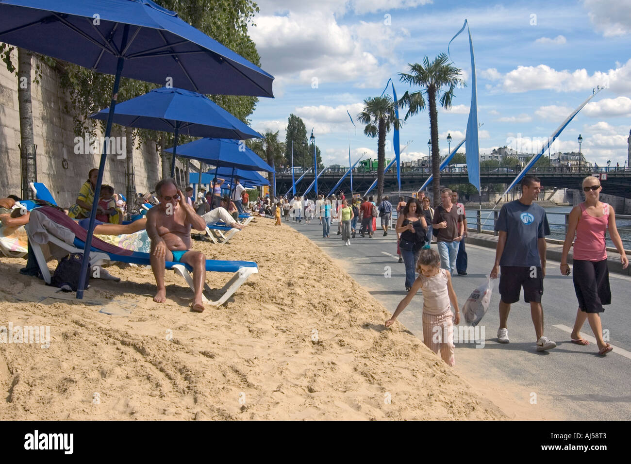 People enjoying the artificial beach during the summer "Paris Plage
