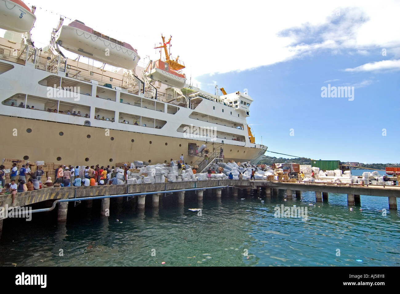 Photo of a Pelni ship in the harbour of Jayapura, a symbol of transmigration. West Papua, Indonesia Stock Photo