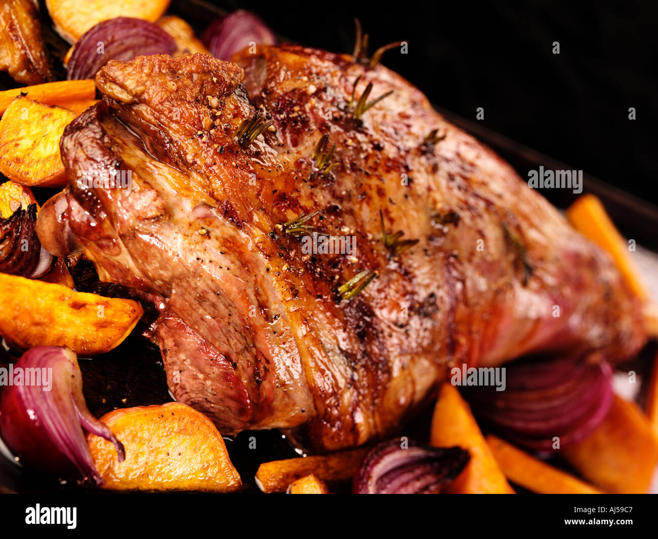 ROAST LEG OF LAMB Stock Photo - Alamy