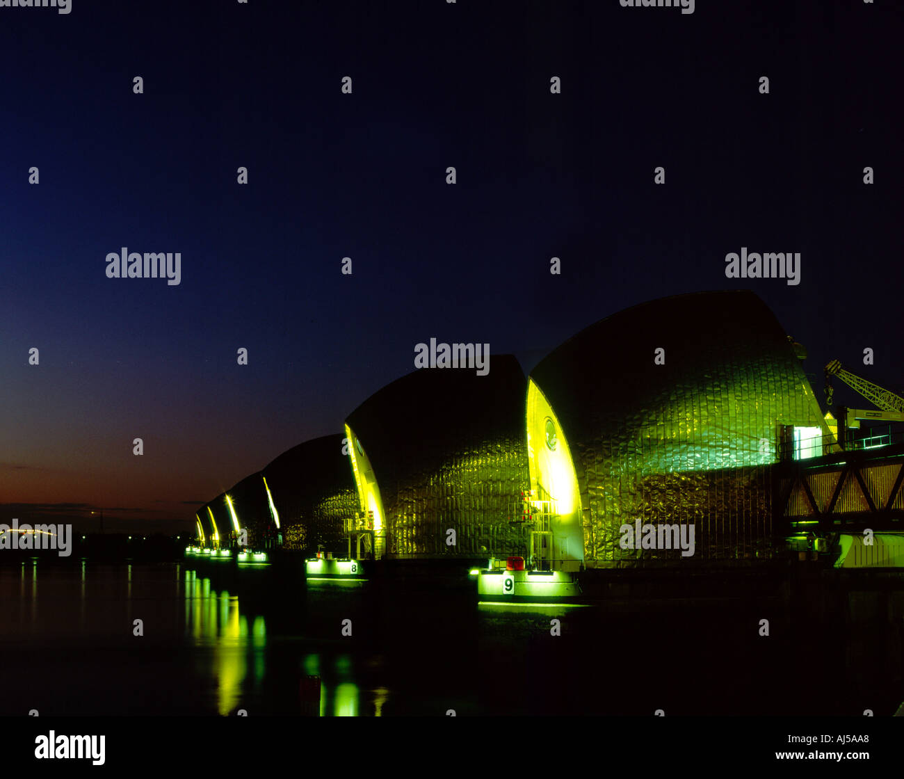 The Thames Barrier at night Stock Photo