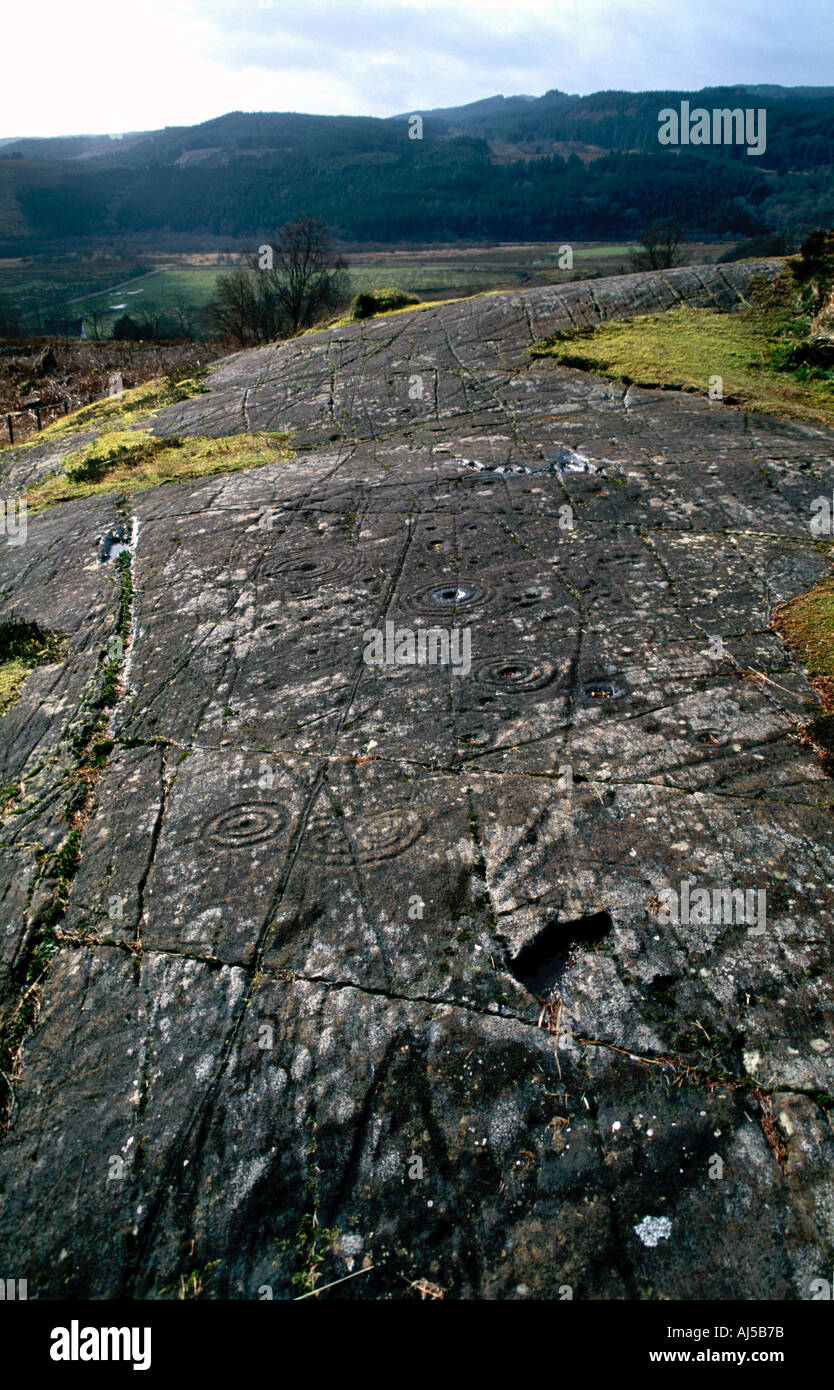 Cup-and-ring marked rocks at Achnabreck Stock Photo