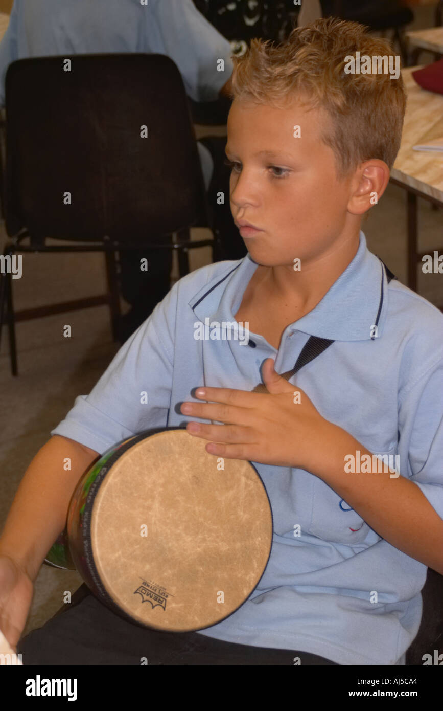 school boy beating drum Stock Photo Alamy