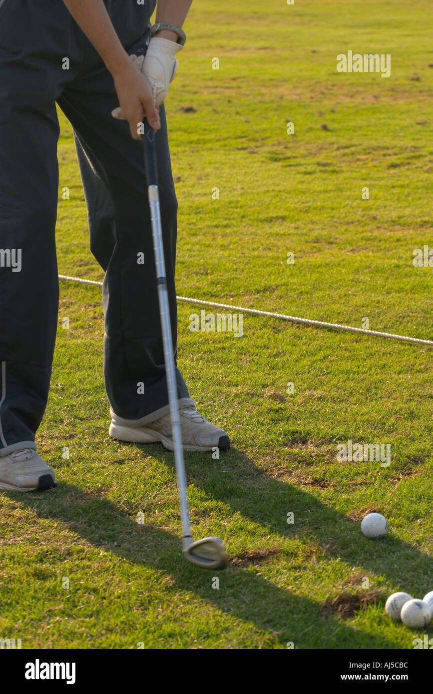 hands gripping golf club Stock Photo Alamy
