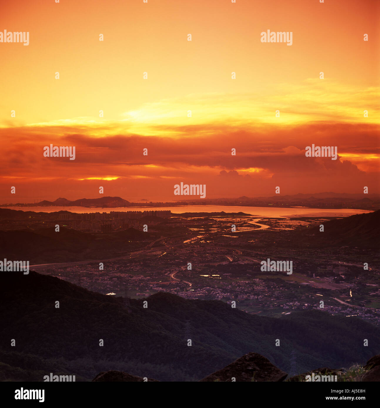 Hong Kong skyline at sunset Stock Photo - Alamy