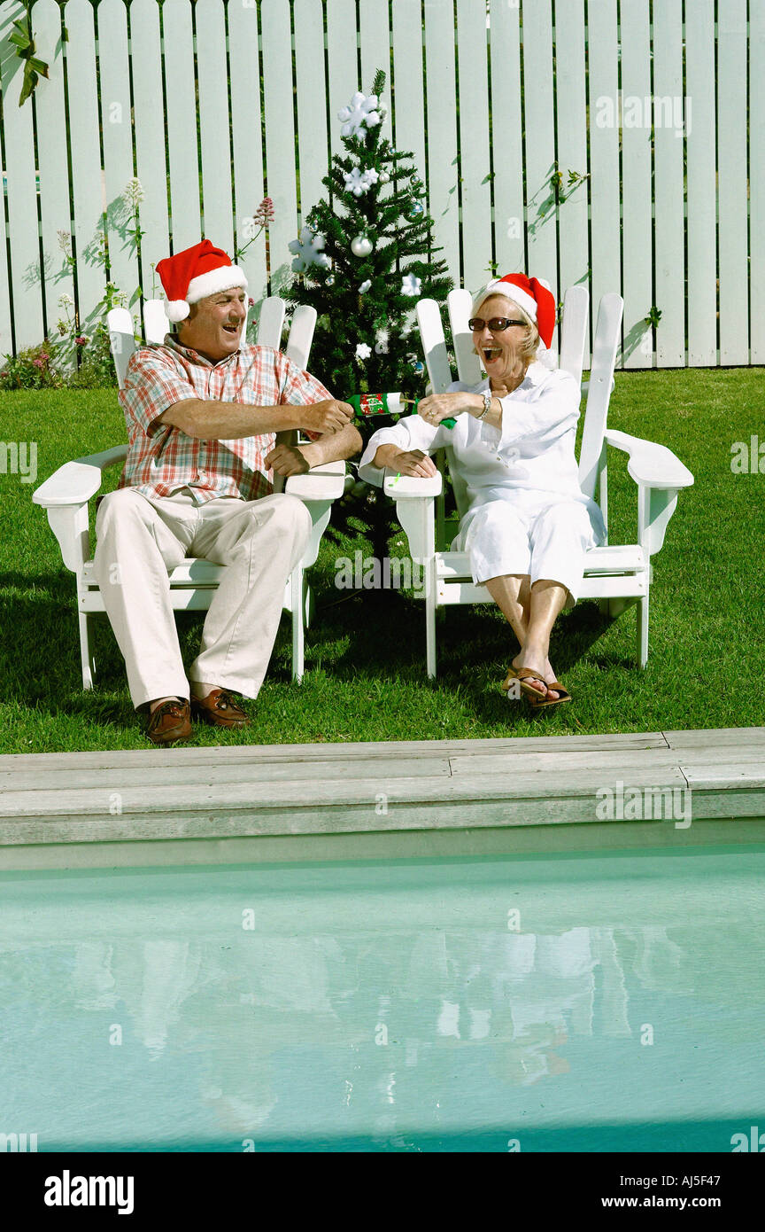 Celebrating christmas by the swimming pool Stock Photo