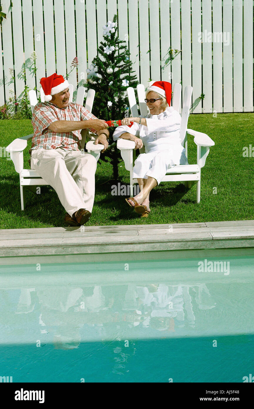 Celebrating christmas by the swimming pool Stock Photo