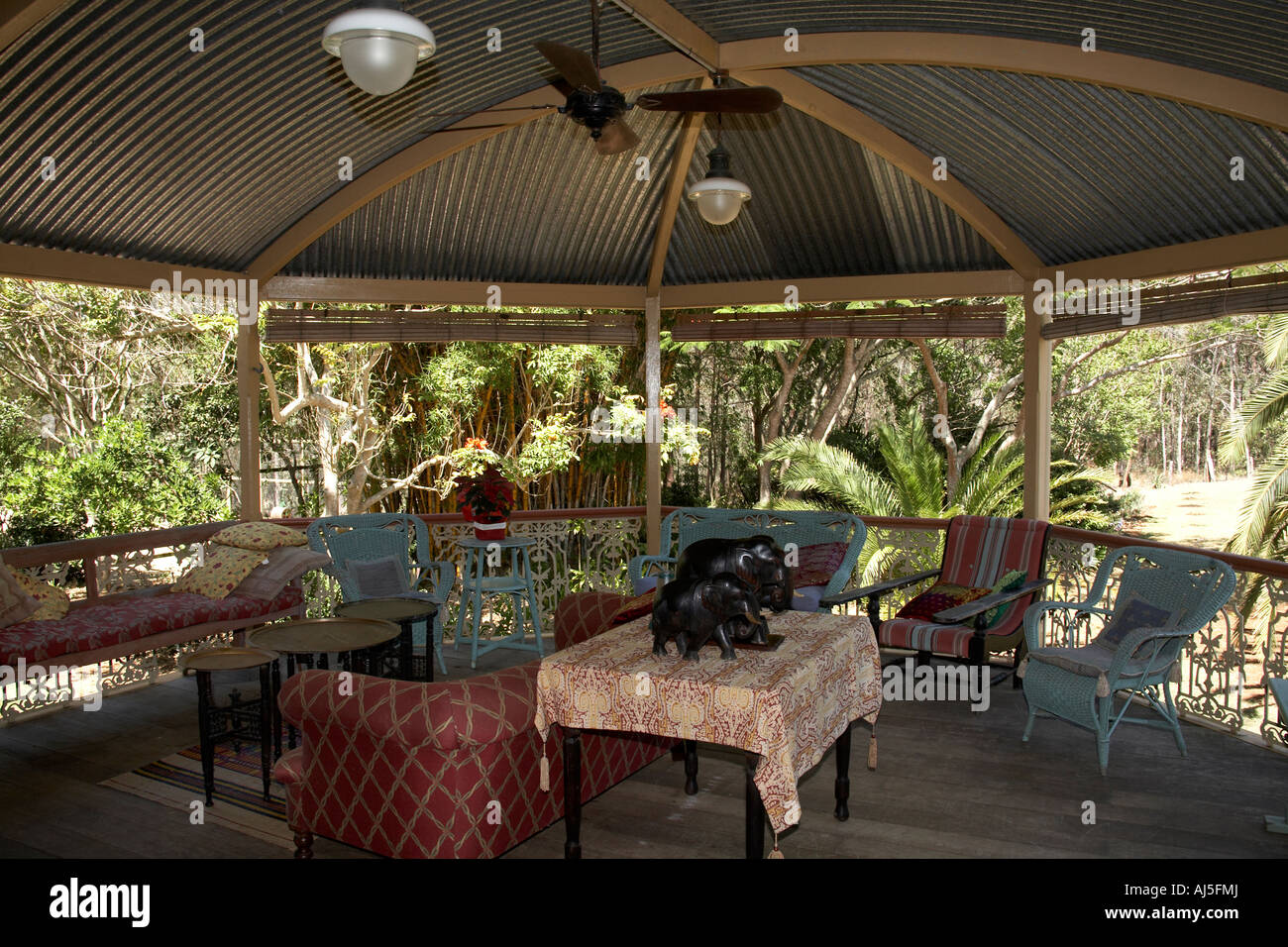 Exterior of old colonial style Queenslander wooden house building with gardens in Dakabin Queensland QLD Australia Stock Photo