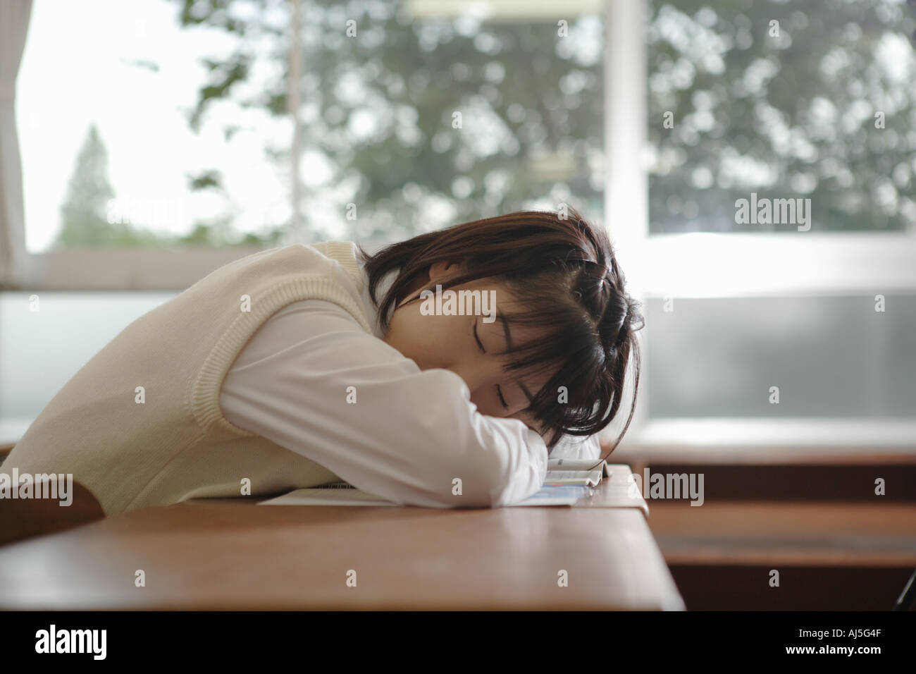 School Girl Sleeping In Classroom Stock Photos & School Girl Sleeping