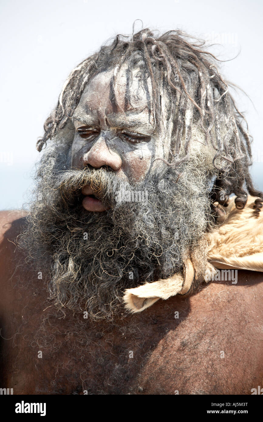 Aborigine or boriginal man with face paint at Three Sisters lookout in Katoomba Blue Mountains New South Wales NSW Australia Fa Stock Photo
