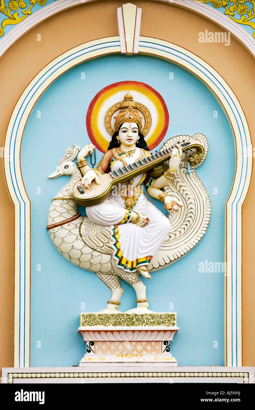 Hindu goddess Saraswati statue located on the front of a university building in the South Indian town of Puttaparthi. Andhra Pradesh, India Stock Photo