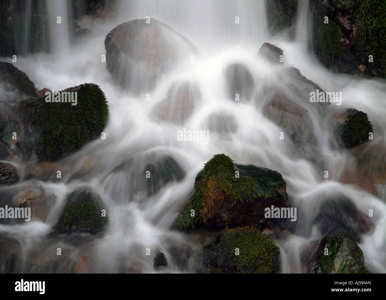 waterfall over rocks Stock Photo