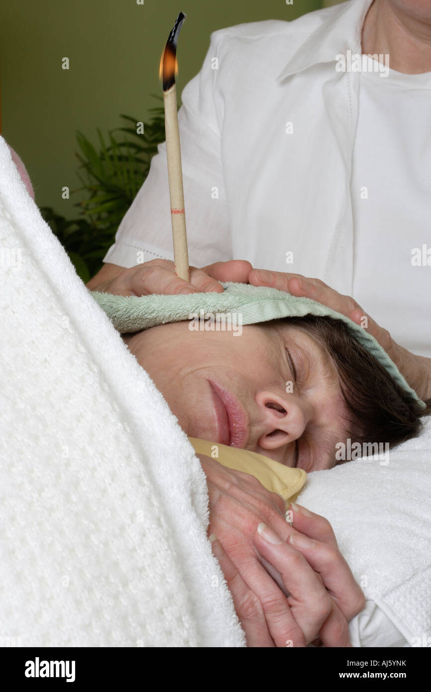 Hopi Ear candle treatment Calms the mind Stock Photo Alamy