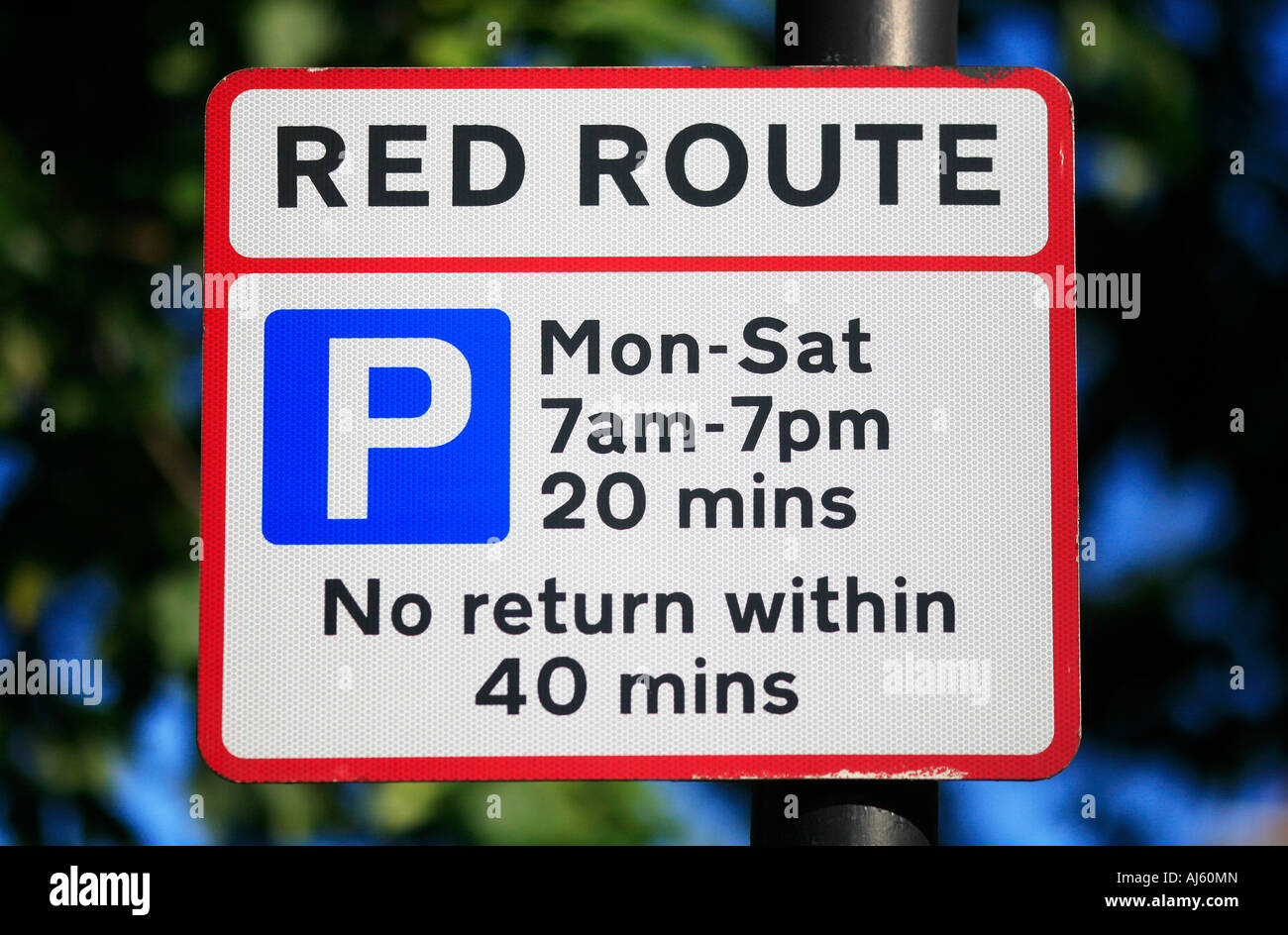 Red route sign on main road in London Stock Photo Alamy
